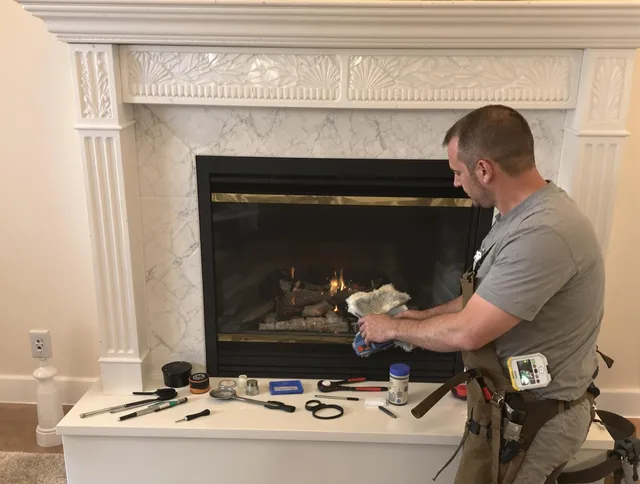 Pompano Beach Chimney Sweep performing fireplace maintenance in Pompano Beach, FL